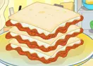 Mia Cooking Lasagna